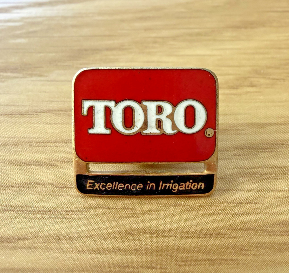 Vintage TORO Irrigation Enamel Pin Excellence In Irrigation 0.6” Approx Ad